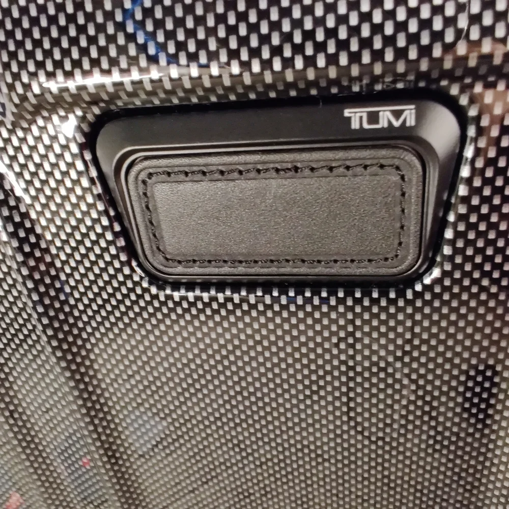 Tumi •upgrade your